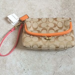 Coach wristlet - pink and orange trim